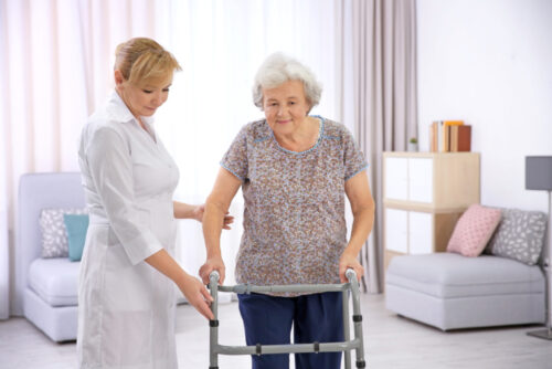 caregiver helping patient