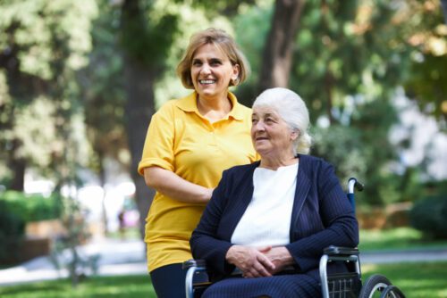 nurse helping elder